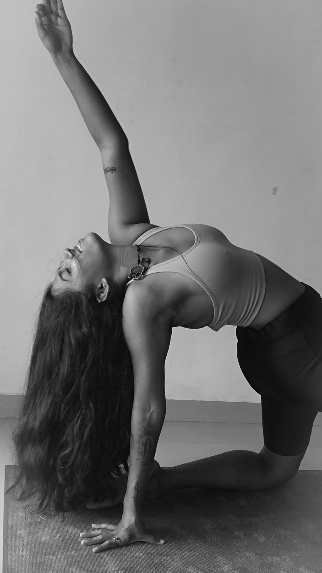 Nitu Patil in a kneeling backbend